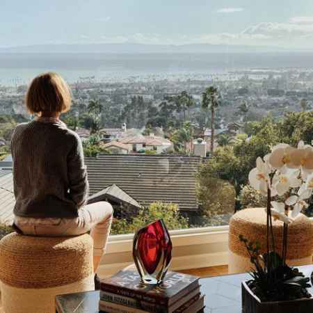 Phillips while on a vacation. know about her net worth, salary, earnings, income, wealth